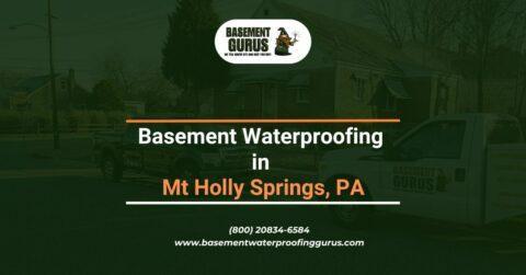 Professional basement waterproofing team sealing foundation walls in Mt Holly Springs, PA.